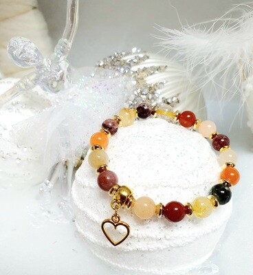 🤩 Magnifique bracelet extensible T.standard 18cm. Perles en véritable Quartz Rutile 🙏 Clarté/Vitalité/Force. Création artisanale. Modèle unique.